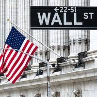 Wall Street slips, dollar shines, RBNZ holds fire