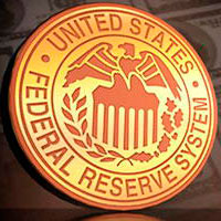 Investors lock gaze on Fed decision